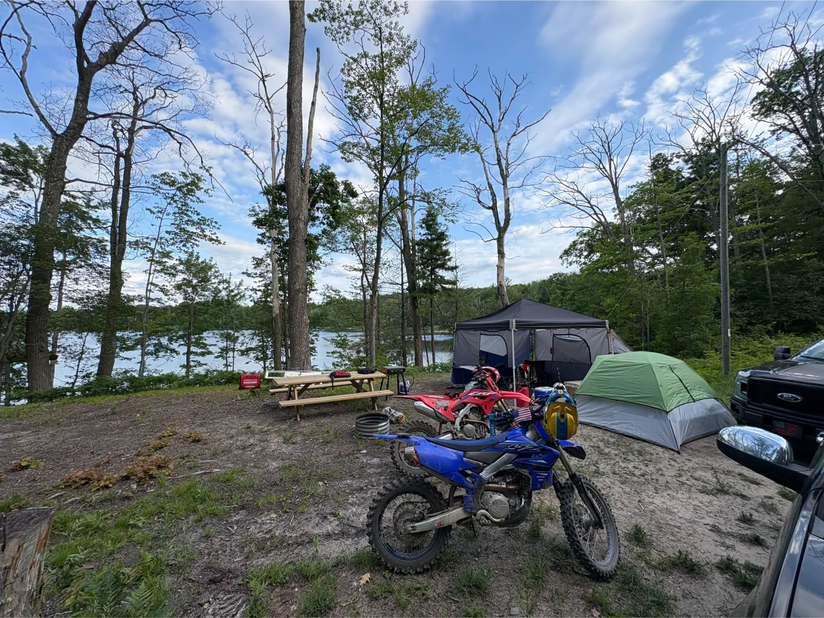 Rustic tent site at Sunrise Lake